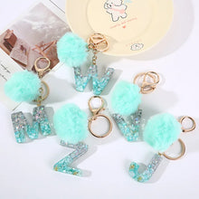 Letter Key Pendant With Green Fluffy Pompom