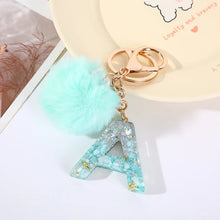 Letter Key Pendant With Green Fluffy Pompom