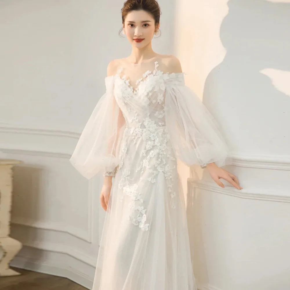 Off-Shoulder Lace Boho Wedding Dress with Long Puff Sleeves