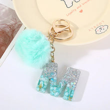 Letter Key Pendant With Green Fluffy Pompom