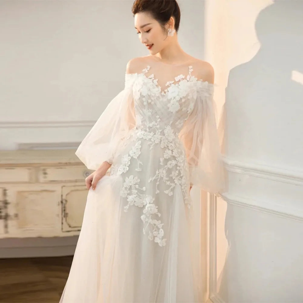 Off-Shoulder Lace Boho Wedding Dress with Long Puff Sleeves