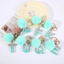 Letter Key Pendant With Green Fluffy Pompom