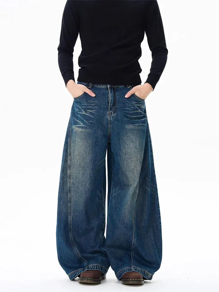 Washed Baggy Curved Blade Jeans