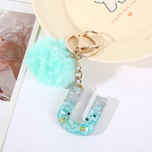 Letter Key Pendant With Green Fluffy Pompom